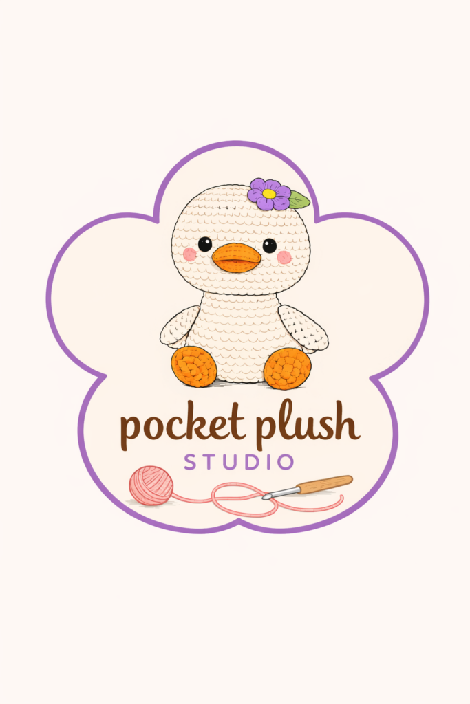 Pocket Plush Studio — a crochet duck with a purple flower
